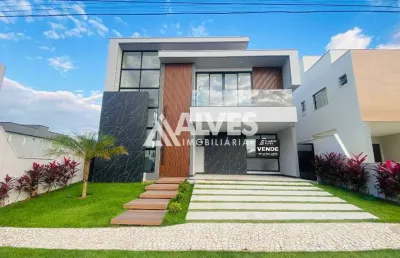 Casa com 4 suítes sendo 3 com closet e varanda piscina e gourmet completa