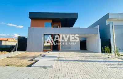 Casa com 3 suítes e áera com gourmet em condomínio de alto padrão