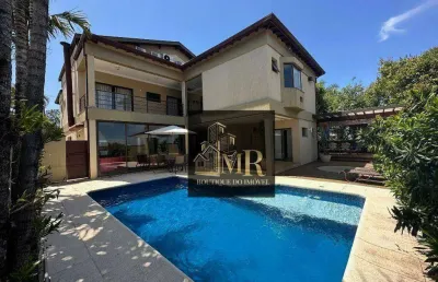 Alphaville campinas  - casa de esquina com 5 dormitórios sendo 3 suítes com terraço, escritório e amplas salas.   522.7 m² área construída 635.38 m²