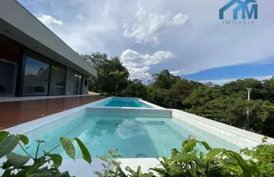 Casa de condomínio com 5 quartos e 7 banheiros à venda, 615 m² por r$ 5.500.000