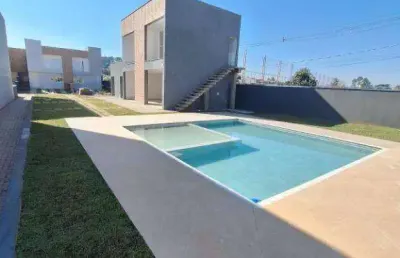 Casa com 3 dormitórios/c 3 suites à venda, 135 m² por r$ 990.000 - condominio village artigas - pouso alegre/mg