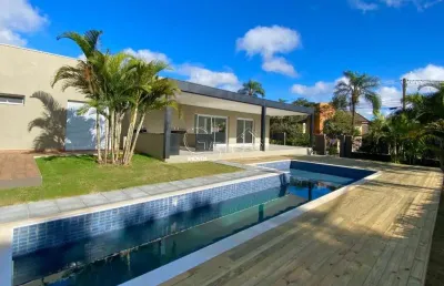 Casa térrea condomínio são joaquim 4 suítes com piscina