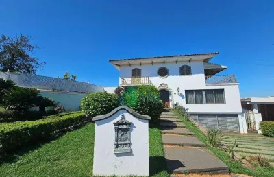 Casa de alto padrão residencial/comercial localizada no bairro ribeirânia, terreno de 1703m² e 862,73m² de área construída, 6 suítes.