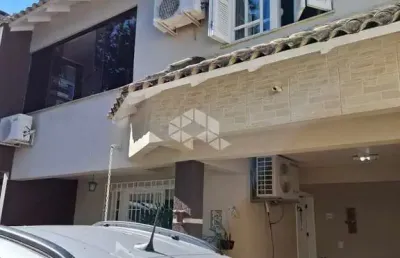 Casa em condomínio fechado com 3 quartos à venda na Rua dos Guaranis, 97, Espírito Santo, Porto Alegre