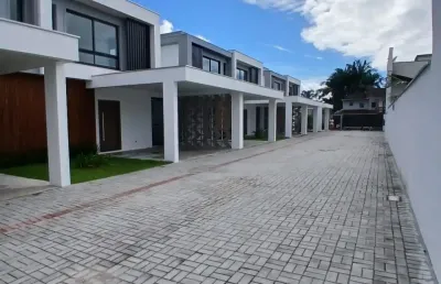 Geminados modernos em condomínio fechado no bairro vila nova