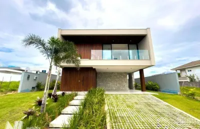 Casa com arquitetura moderna e lazer privativo no alphaville catuana - 450m² de