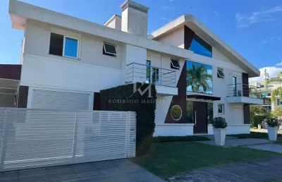 Casa 4 suites á 250 metros do mar  jurerê internacional - florianópolis - sc