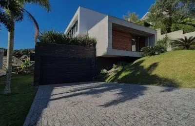 Casa de 3 suítes à venda no cacupé, florianópolis, com vista para o mar