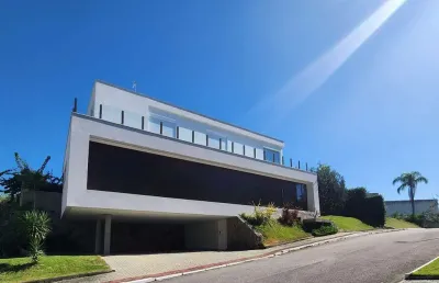 Casa com 4 suítes à venda em condomínio no cacupé, florianópolis