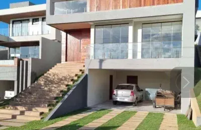 Casa em condomínio fechado com 4 quartos à venda na r. imbassaí, abrantes, camaçari por r$ 1.850.000