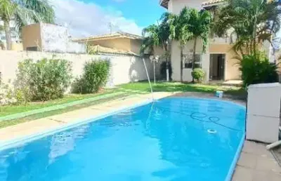 Casa em condomínio fechado com 4 quartos à venda na rua ana c b dias, 2, buraquinho, lauro de freitas por r$ 850.000