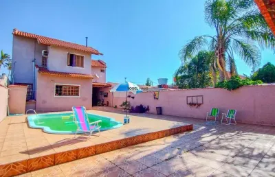 Casa com 4 quartos à venda no Estância Velha, Canoas 