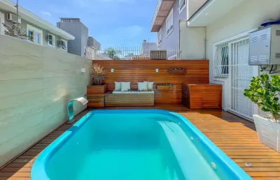 Casa impecável no bairro mont serrat com piscina, placas solares e área gourmet