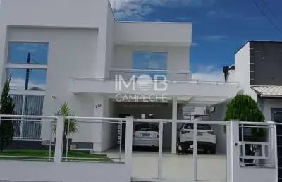 Casa com 4 quartos à venda na rua ipê rosa, 258, carianos, florianópolis por r$ 1.900.000