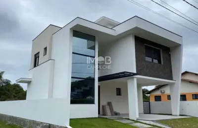 Casa em condomínio fechado com 3 quartos à venda na rua do lamim, 2850, canasvieiras, florianópolis por r$ 2.019.900