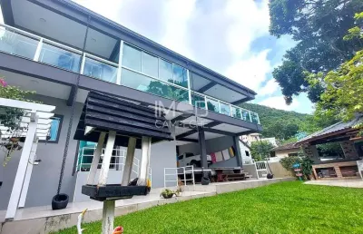 Casa com 3 quartos à venda na servidão alvim aguedes borges, 101, pântano do sul, florianópolis por r$ 1.490.000
