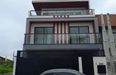 Casa com 3 quartos à venda na rua brasilia, praia do quilombo, penha por r$ 1.950.000