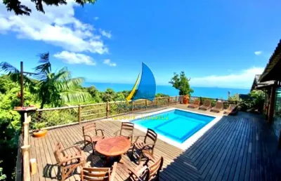 Alto padrão - em condomínio na costeira - vista mar.