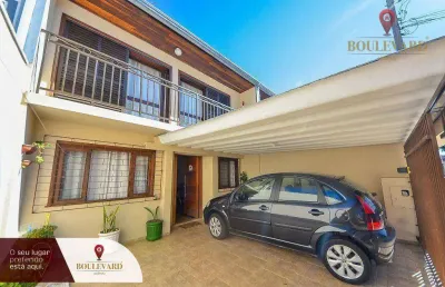Sobrado de frente para a rua, com 3 dormitórios à venda, 110 m² por r$ 550.000 - uberaba - curitiba/pr