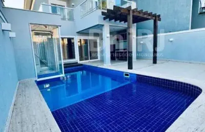Casa de luxo 4 suítes em condomínio com clube completo