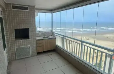 Apartamento de frente para a praia com 2 vagas de garagem, lazer completo.