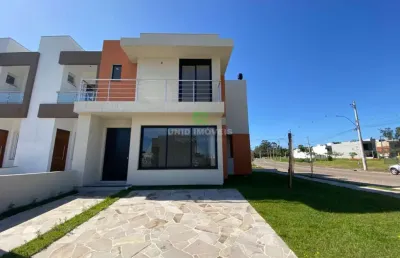 Lindo sobrado com design moderno e ao mesmo tempo com um ar contemporâneo, fachada possui revestimento com plaquetas de tijolo a vista que dá um certo