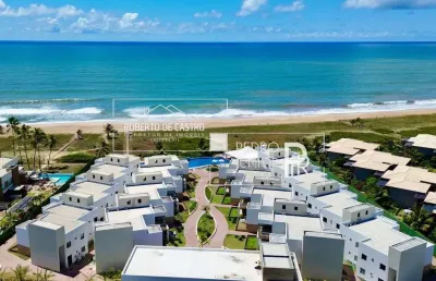 Apartamento à venda em itacimirim térreo em condomínio frente mar