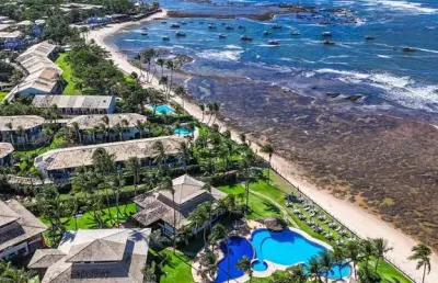 Apartamento térreo frente mar 3/4 alto padrão na vila de praia do forte