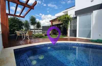 Casa de 340m² à venda no bairro pousada dos campos em pouso alegre. 4 suítes, piscina com deck e acabamento em alto padrão