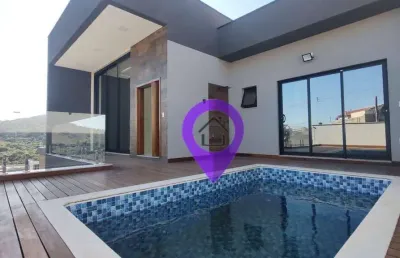 Casa de 220m² à venda em pouso alegre com 3 suítes, piscina e área gourmet. excelente localização a 10min do centro. 4 vagas de garagem