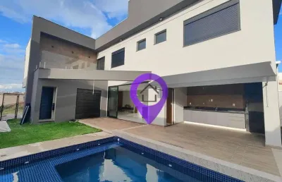 Casa com 4 dormitórios no condomínio las palmas, 228m² construídos. destaques: suíte máster com hidromassagem, piscina aquecida tecnologia sustentável
