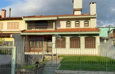 Casa com 5 quartos à venda na Rua Jaguari, 748, Cristal, Porto Alegre