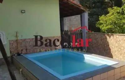 Casa em condomínio fechado com 4 quartos à venda na avenida doutor eugênio borges, rio do ouro, são gonçalo, 180 m2 por r$ 450.000