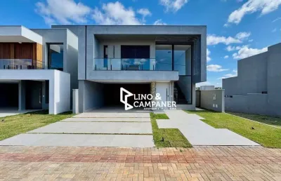 Casa com 3 suítes à venda, 210 m² por r$ 1.650.000 - condomínio parque tauá - araçari - londrina/pr