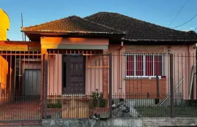 Casa com 4 quartos à venda no Marechal Rondon, Canoas 