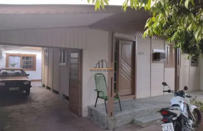 Terreno com duas casas localizado no bairro estância velha/canoas