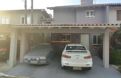 Casa em condomínio localizada no bairro harmonia/canoas