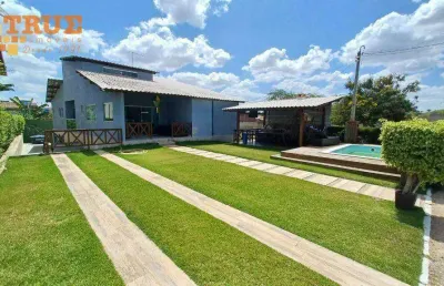 Casa em condomínioc com 5 suítes com piscina e pub inglês