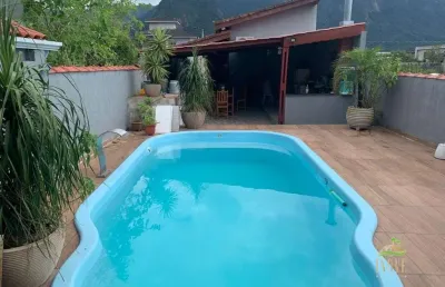 Casa a venda  morada da praia - bertioga - sp: 3 quartos, 2 suítes, piscina e churrasqueira!