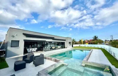 Oportunidade: casa de alto padrão à venda em morada da praia, bertioga/sp - 4 quartos, 3 suítes, área gourmet e piscina aquecida!