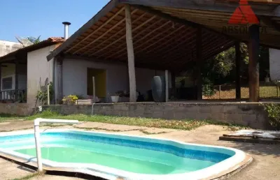 Excelente chácara com 02 casas no asfalto na praia dos namorados.