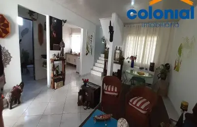 Casa com 4 quartos , 1 suíte e salão comercial amplo