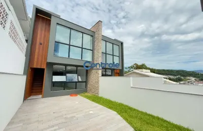 Casa com 3 quartos à venda na rua josé fermino da silva, 230, forquilhas, são josé por r$ 620.000