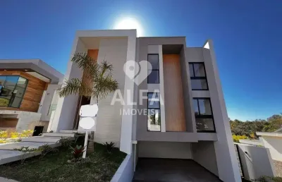 Conforto e estilo em dois andares: casa com 4 dormitórios, 2 suítes em condomínio fechado!