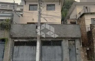 Sobrado em santana com 4 dormitórios e 2 vagas de garagem.