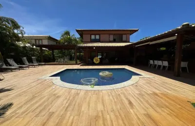 Casa 4 suítes no condomínio casas da praia do forte-ba