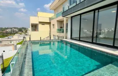 Casa com 4 dormitórios à venda, 305 m² por r$ 3.700.000,00 - condomínio real park - arujá/sp