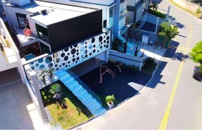 Arquitetura moderna - casa com 3 dormitórios à venda, 341 m² por r$ 3.800.000 - jardim fazenda rincão - arujá/sp