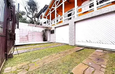 Casa com 3 quartos à venda na Rua Cachoeira, 54, Nonoai, Porto Alegre