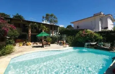 Casa com 4 quartos e jardim em guaxuma valor- r$ 2.100.000,00